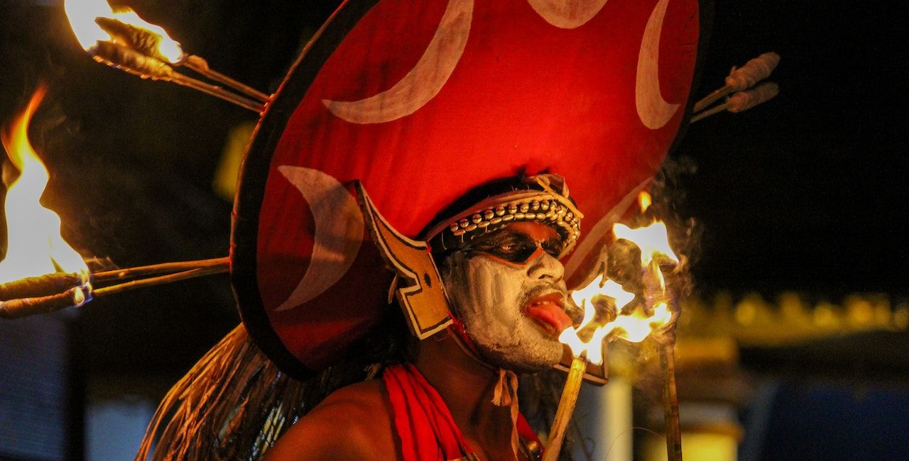 A photo of a traditional artist from Kerala.